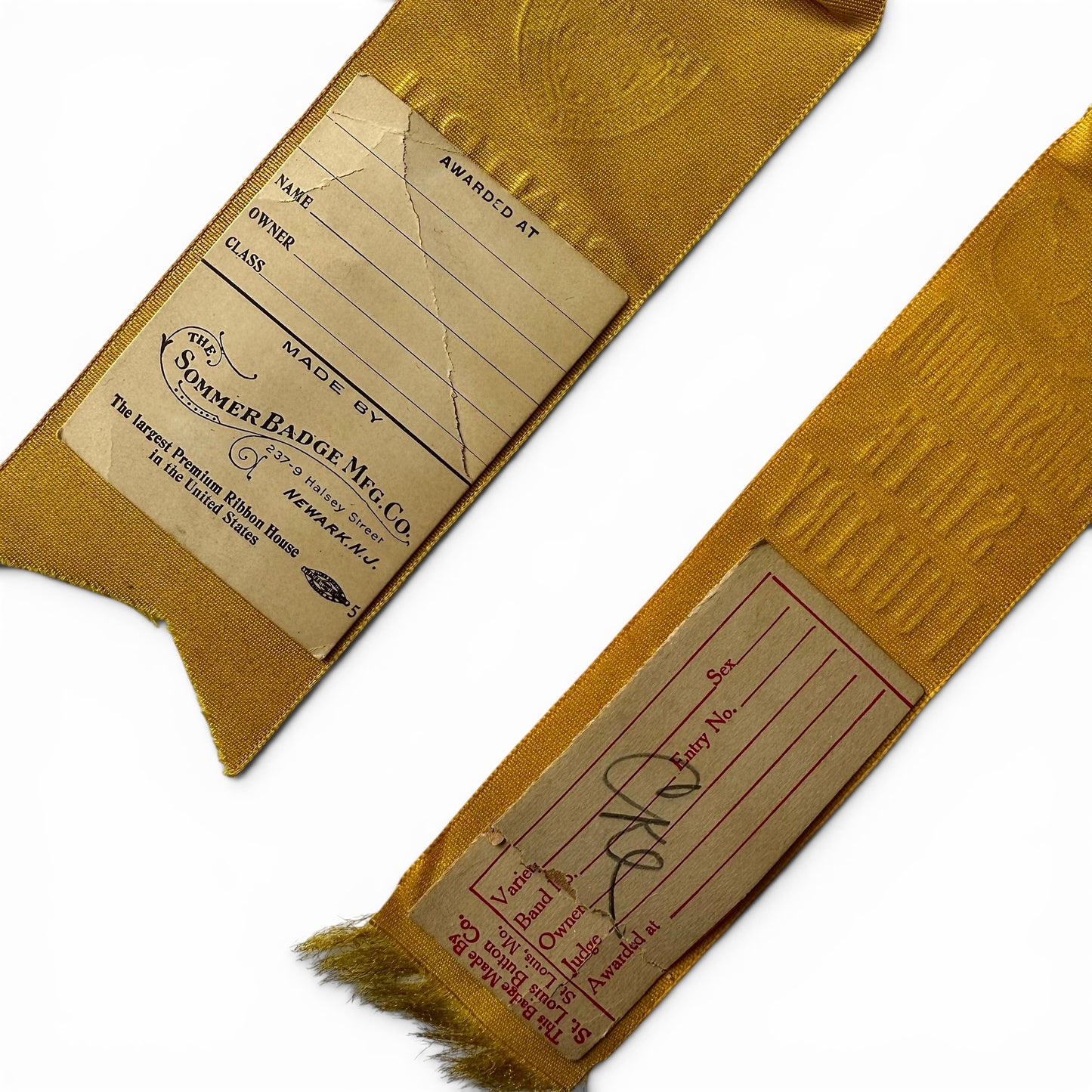 Pair of Poultry Show Award Ribbons 1912-1914 Two gold ribbons with attached labels on a white background