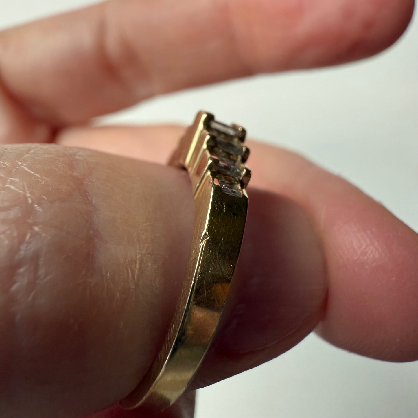 Pyramid Rise 14k Yellow Gold Princess Cut .54ctw Diamond Ring on hand side view