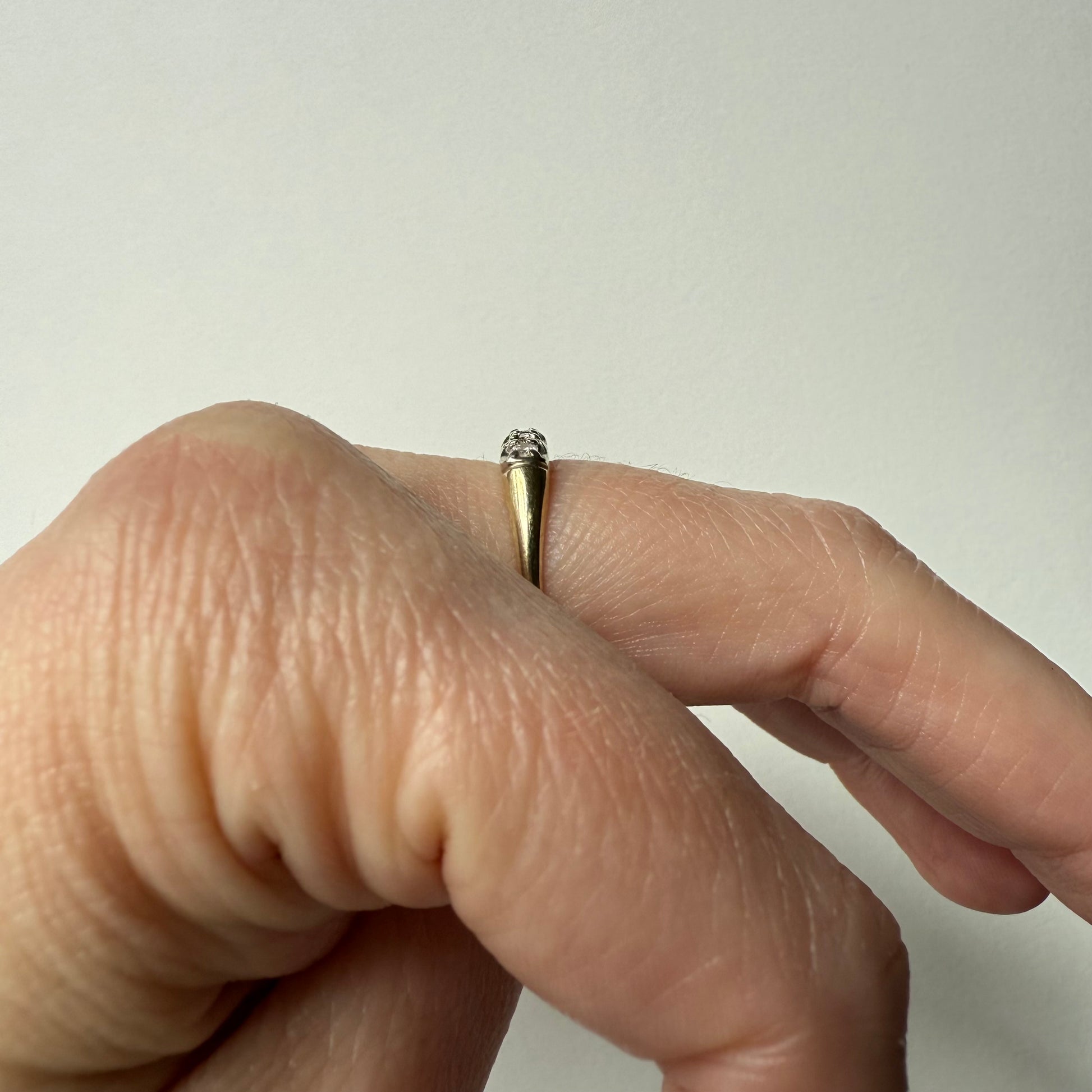 14K Yellow Gold .25ctw 5 Diamond Band Ring on hand side view