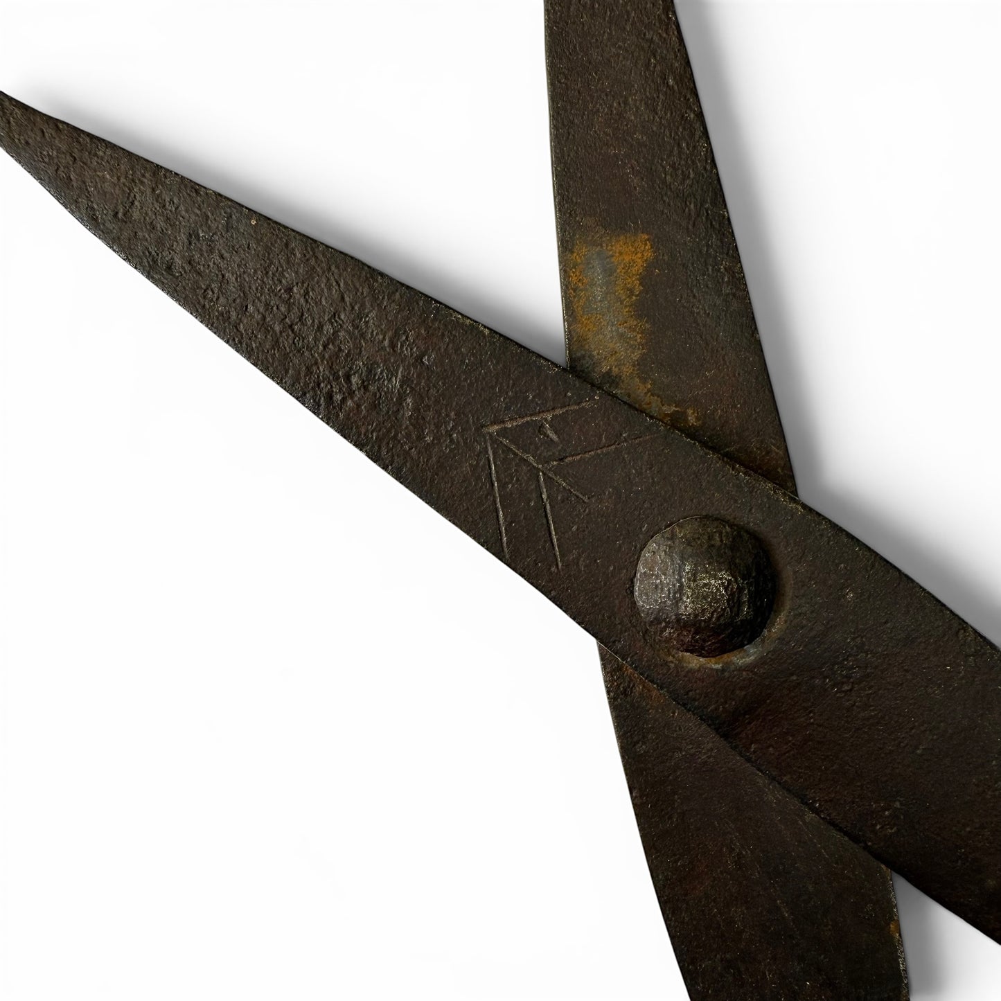 18th Century Hand-Forged Scissor Close-up of a pair of rusty scissors on a white background