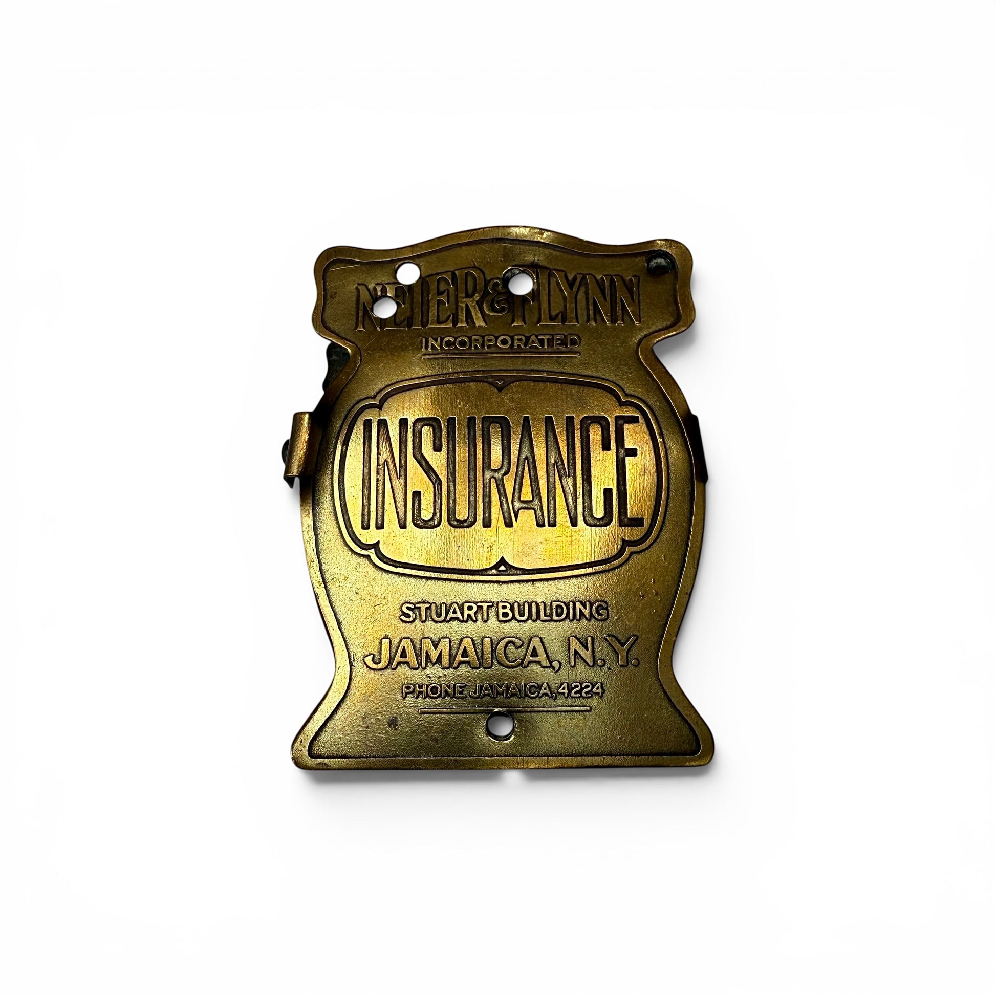 1920s "Insurance" Brass Advertising Paper Clip Vintage brass insurance sign with engraved text on a white background
