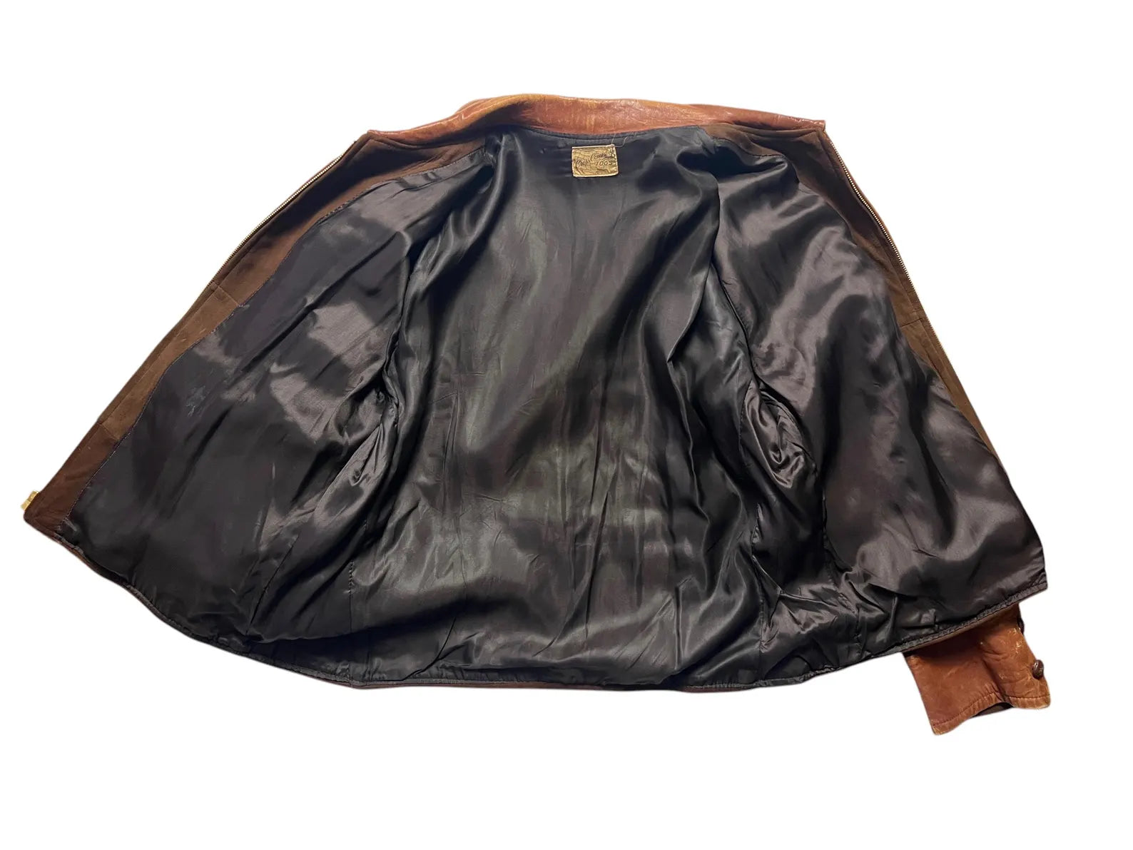1930/1940s Cross Country Togs 2-Tone Half Belt Back Leather Jacket Brown leather jacket with a visible brand logo on a white background