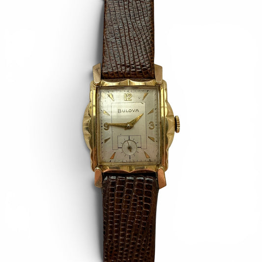 1950's "Senator" Bulova Manual Wind Watch Vintage Bulova watch with brown strap on a white background
