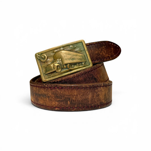 1950s Goodyear Semi Truck Brass Buckle Leather Belt Brown leather belt with a decorative brass buckle on a white background