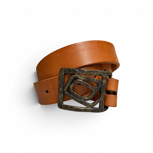 1960s Hammered Brass Abstract Buckle Leather Belt Brown leather belt with a large brass buckle on a white background
