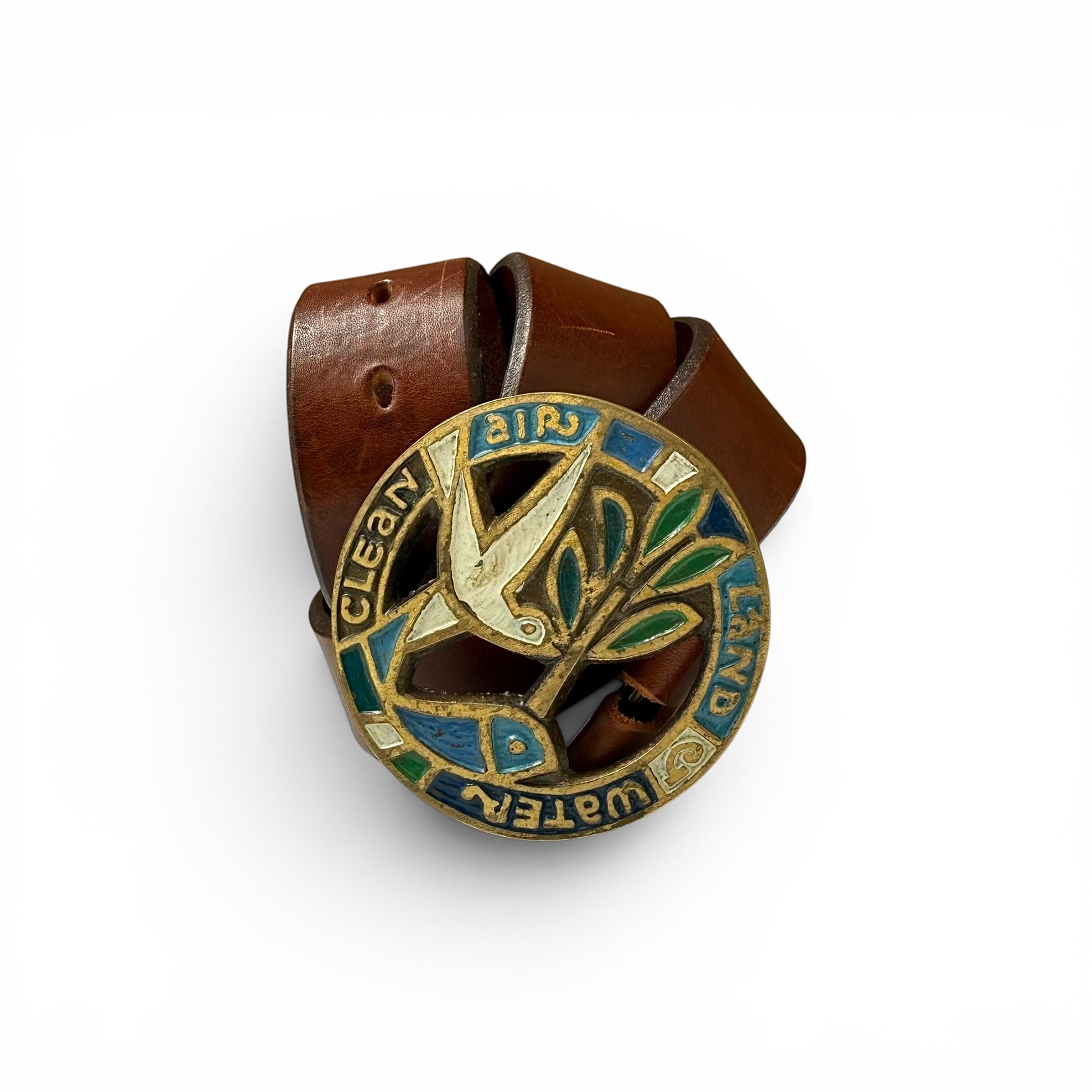 1970 Enamel And Brass "Clean Air Land Water" Buckle Leather Belt Brown leather belt with a decorative buckle featuring a bird design on a white background