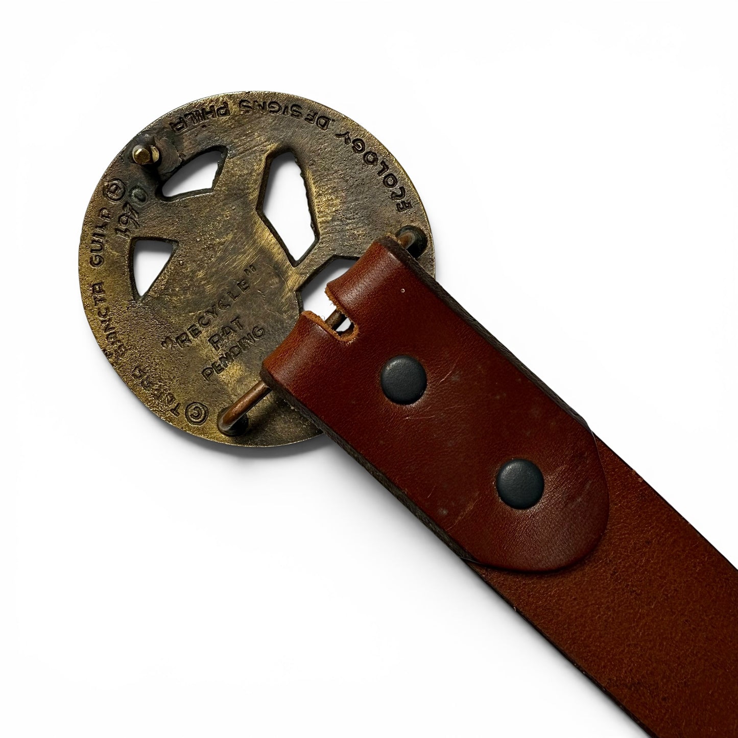 1970 Enamel And Brass "Clean Air Land Water" Buckle Leather Belt Brown leather belt with a brass buckle on a white background