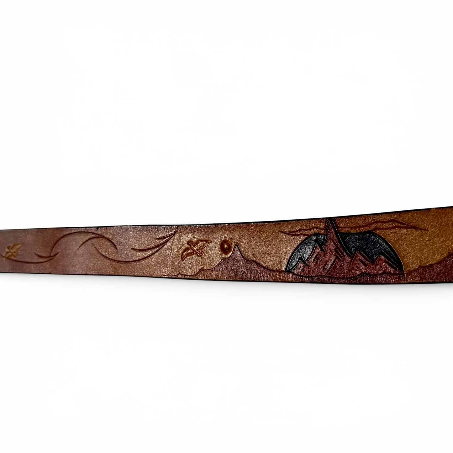 1970s Brass Eagle In Sunburst Tooled Leather Belt Brown leather belt with embossed design on a white background