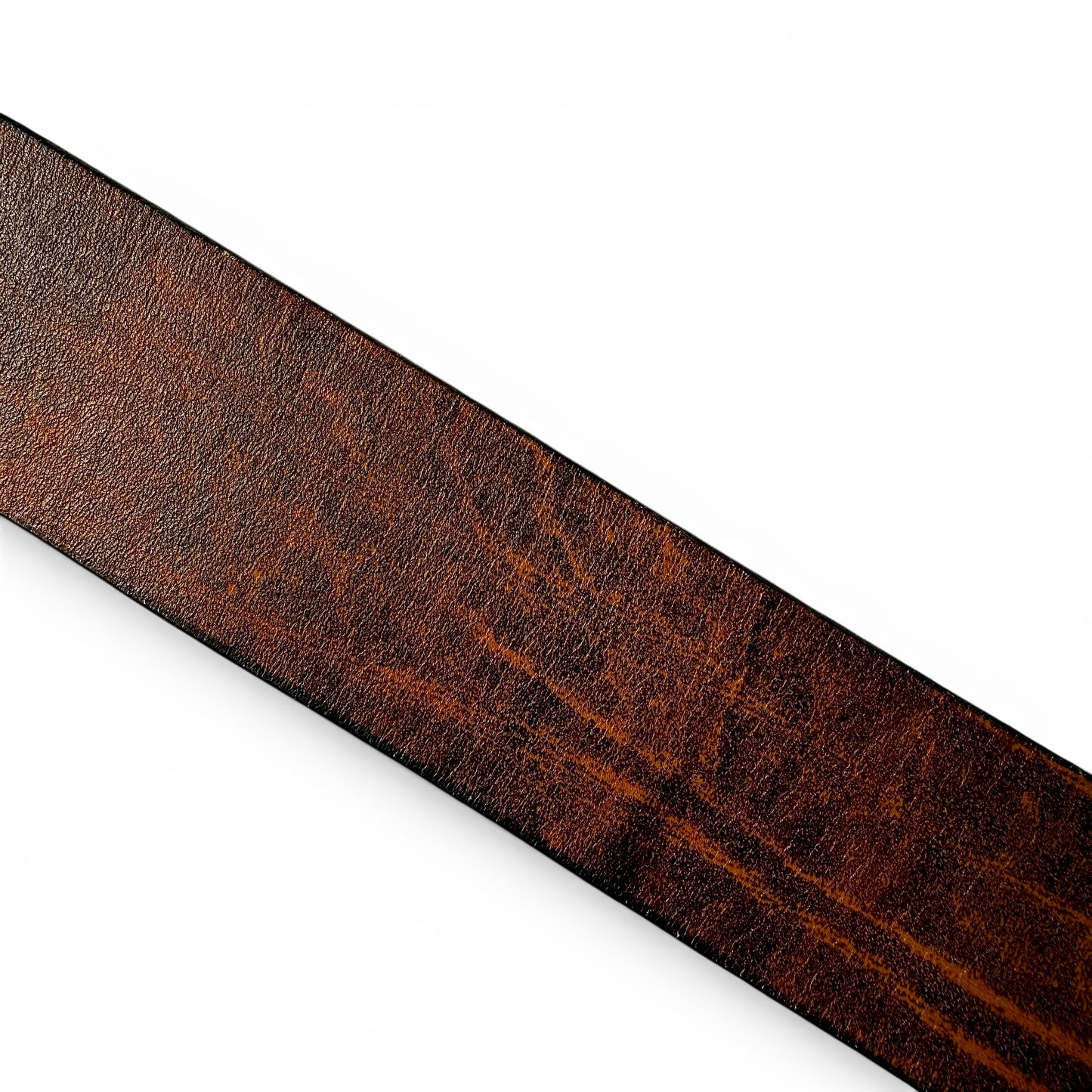 Close-up of a brown leather belt on a white background