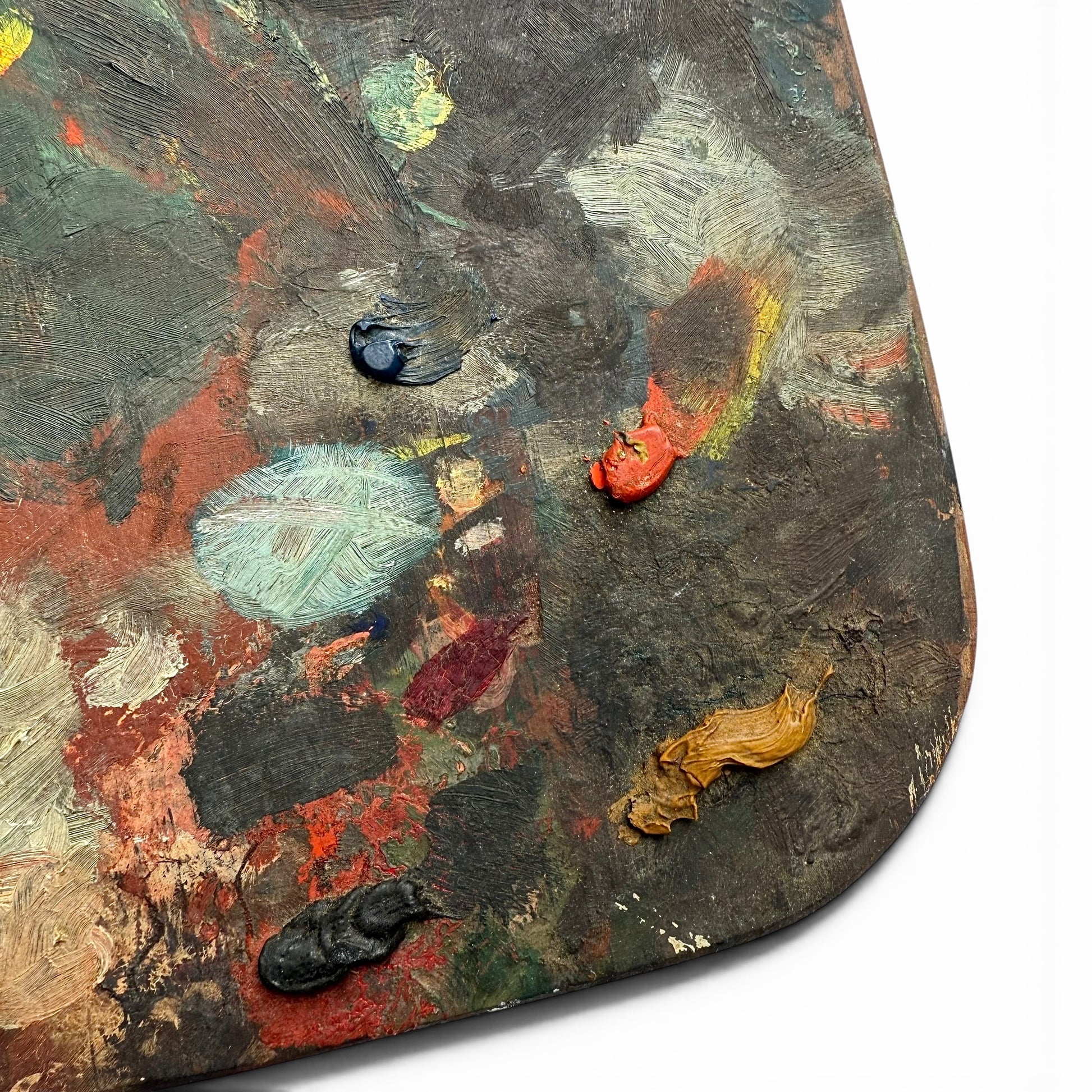 19th Century Double-Sided French Painters Palette Artistic palette with various paint colors on a white background