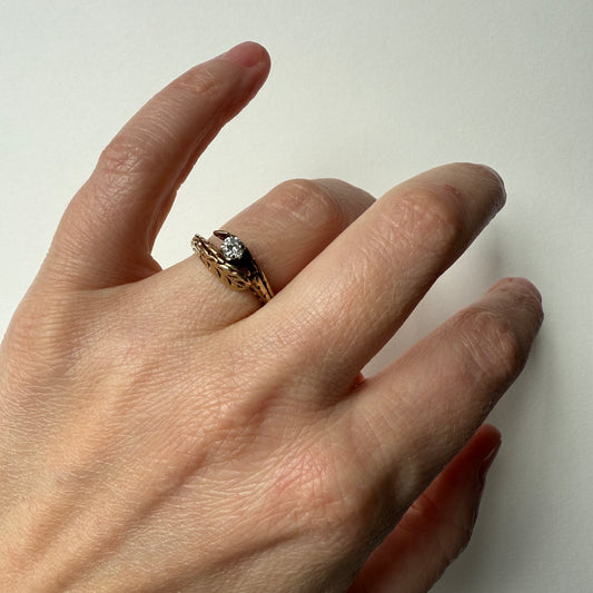 Antique European Cut .25ct Diamond Bypass 14k Ring on hand