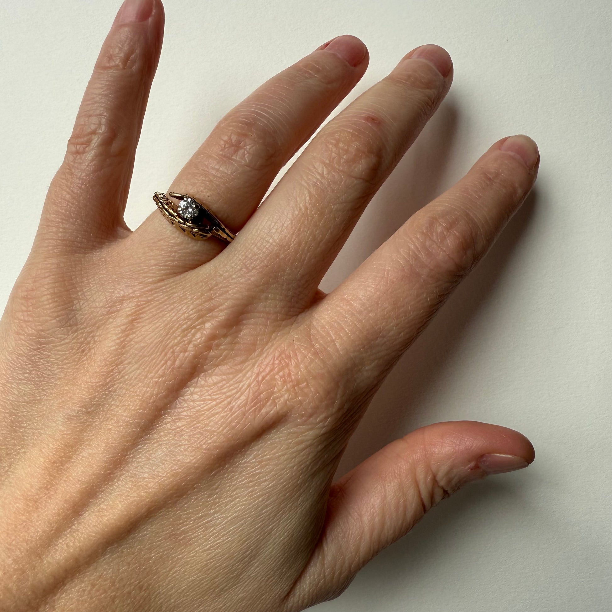 Antique European Cut .25ct Diamond Bypass 14k Ring on hand
