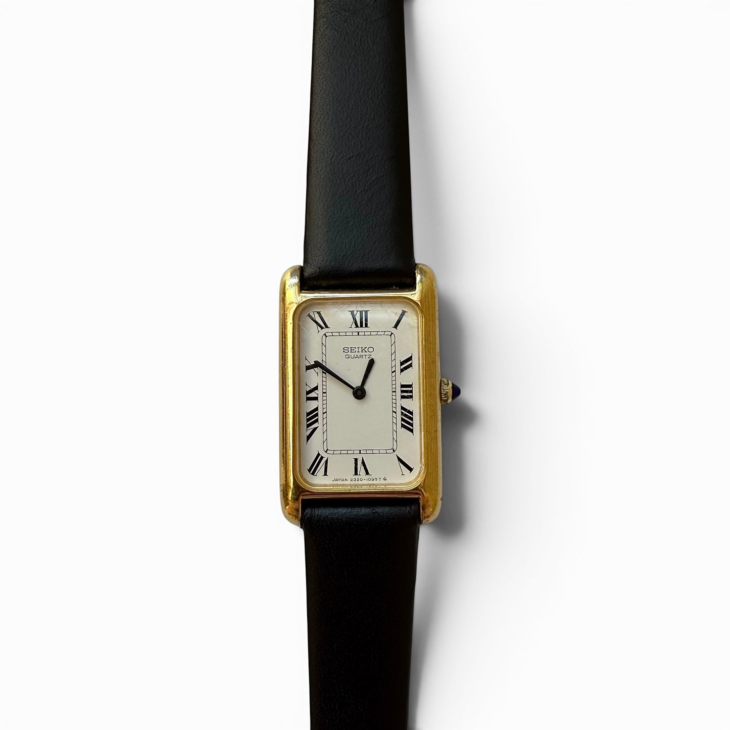 Circa 1980 Seiko Quartz "Tank" Watch ( Made in Japan) Rare Seiko watch with black strap on a white background