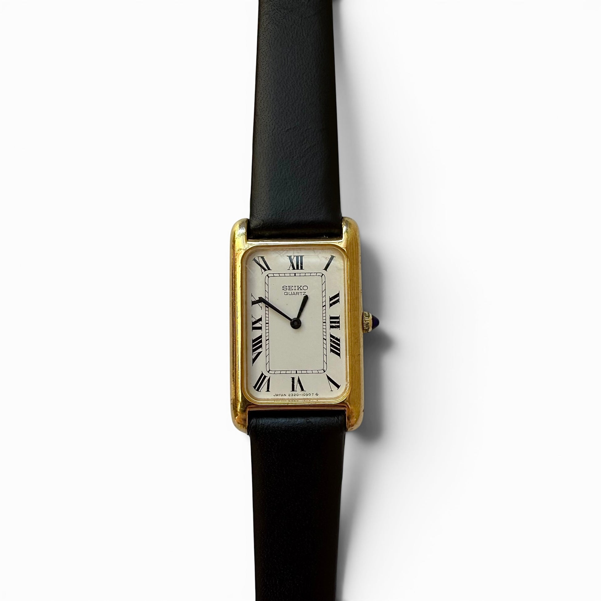 Circa 1980 Seiko Quartz "Tank" Watch ( Made in Japan) Rare Seiko watch with black strap on a white background