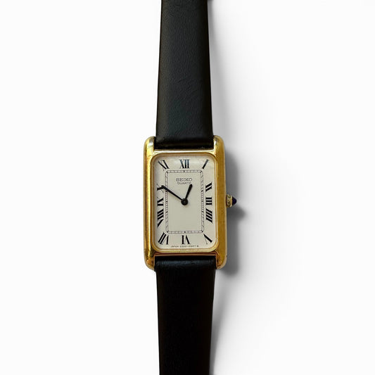 Circa 1980 Seiko Quartz "Tank" Watch ( Made in Japan) Rare Seiko watch with black strap on a white background