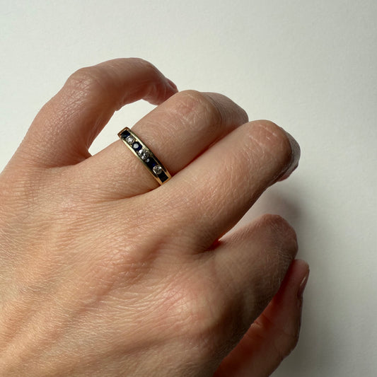 Diamond and Sapphire 14k Half Eternity Ring on hand