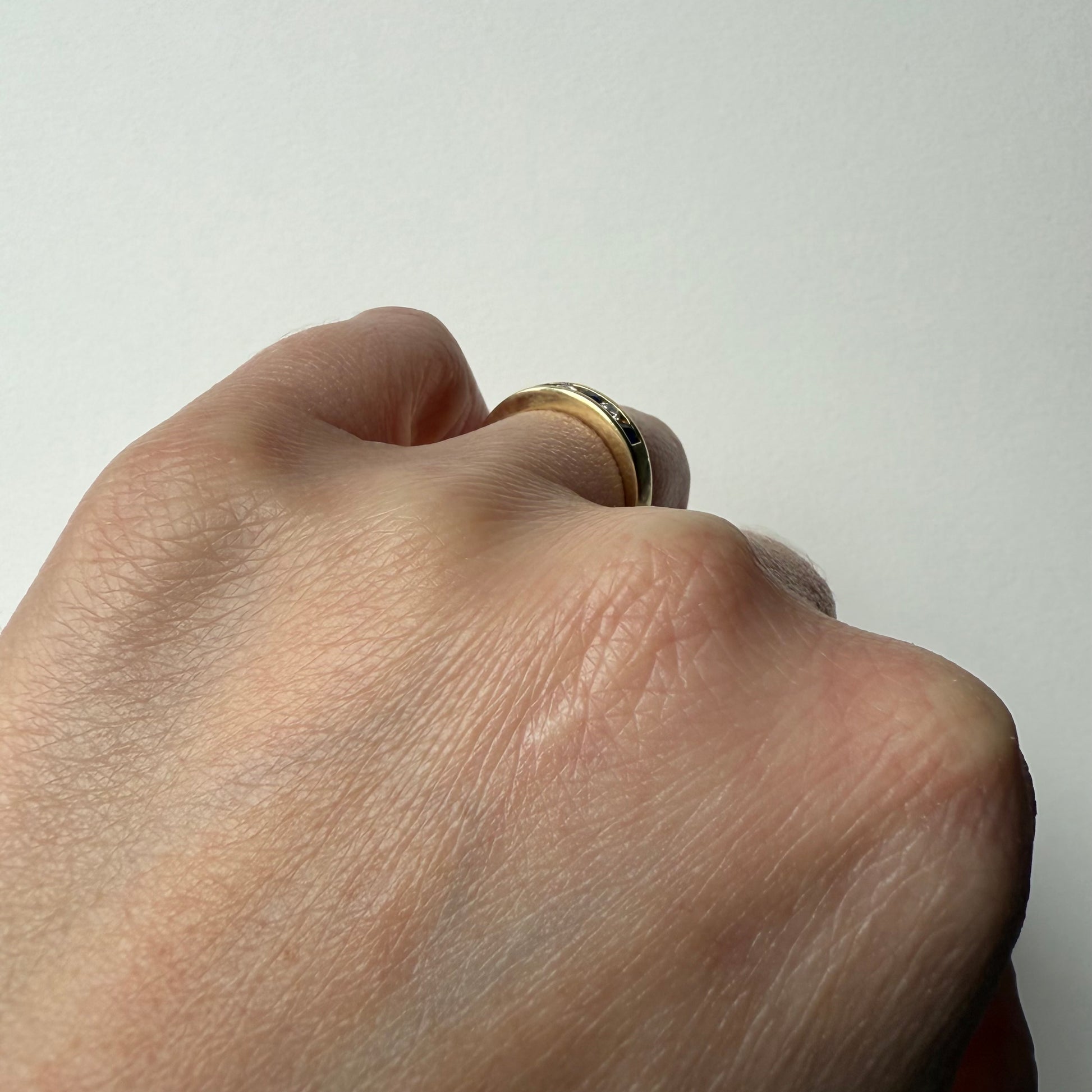 Diamond and Sapphire 14k Half Eternity Ring on hand side view