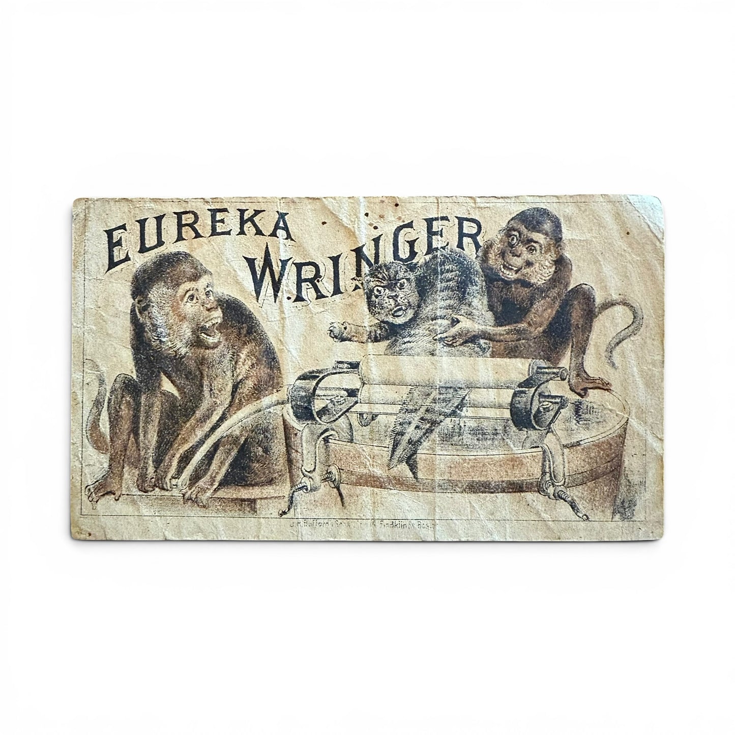 Eureka Ringer - Victorian Trade Card advertisement for Eureka Wringer with monkeys a cat and a washing machine.