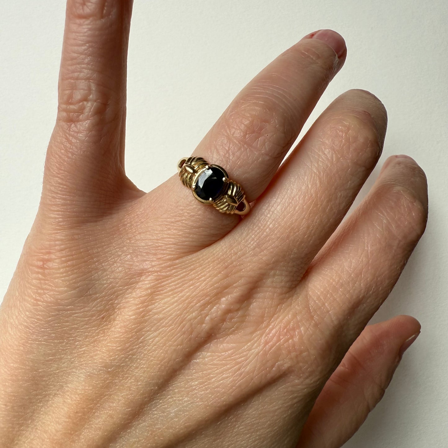 French Art Deco 14k Yellow Gold Sapphire Ring on hand