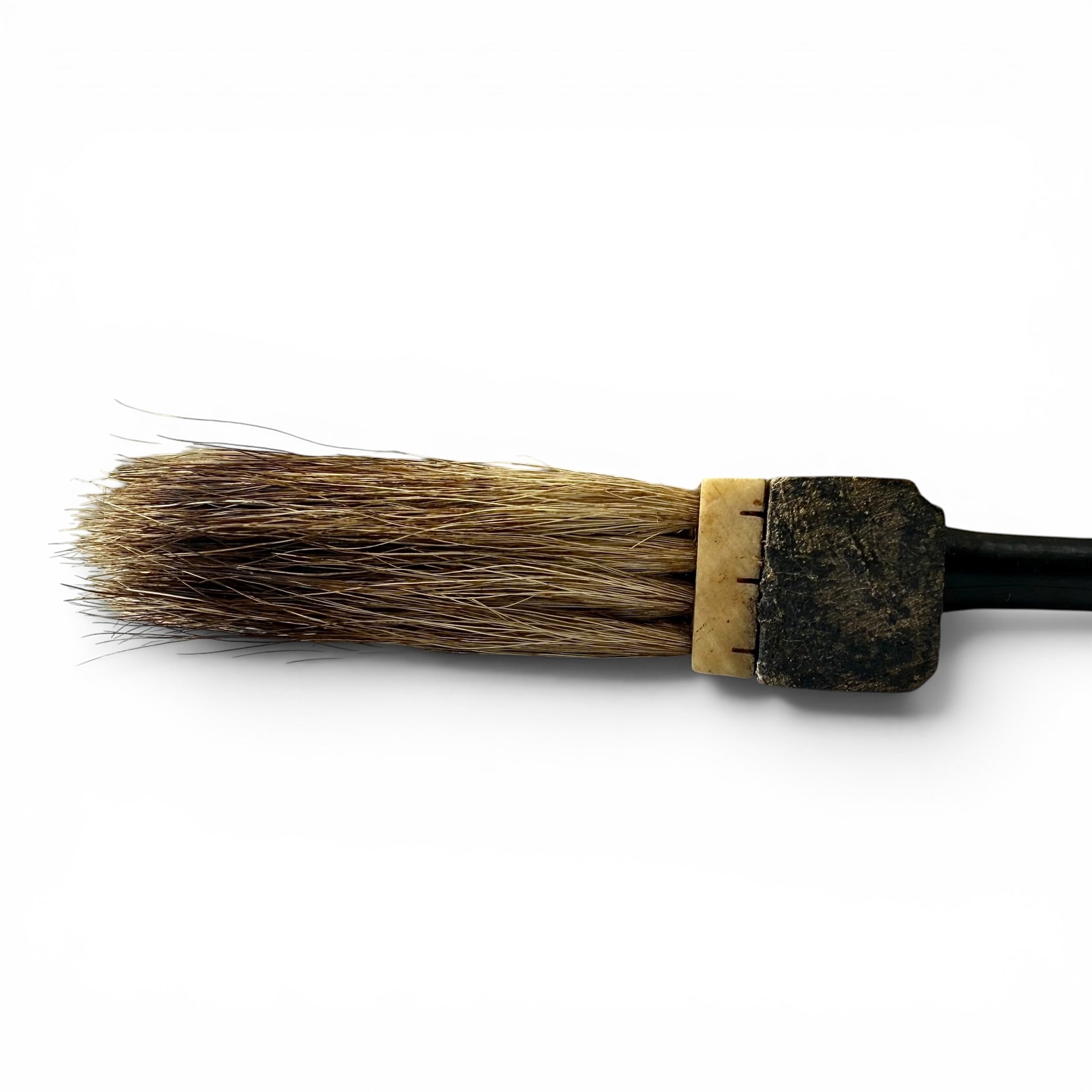 Late 19th Century Badger Hair Paint Brush Old paintbrush with a wooden handle and bristles on a white background