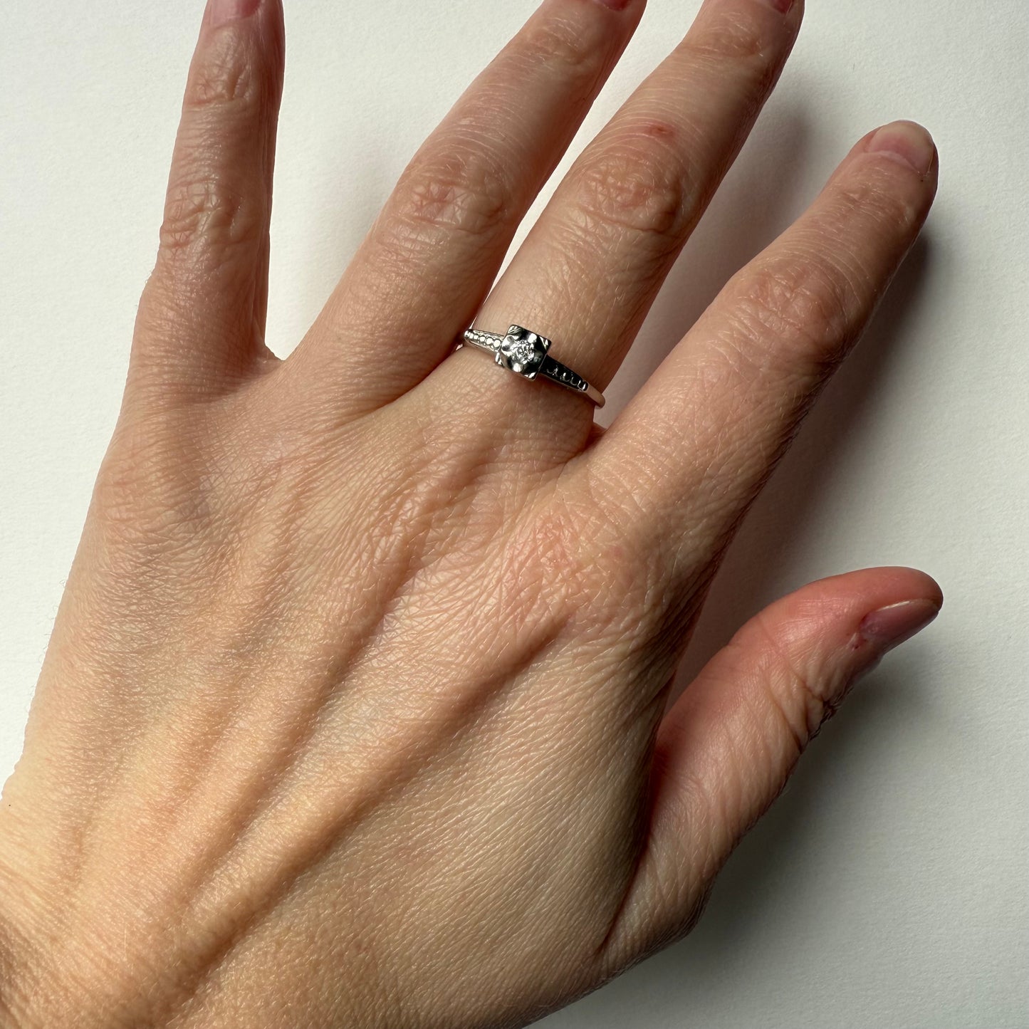 Old Mine Diamond Solitaire 14k White Gold Ring on hand