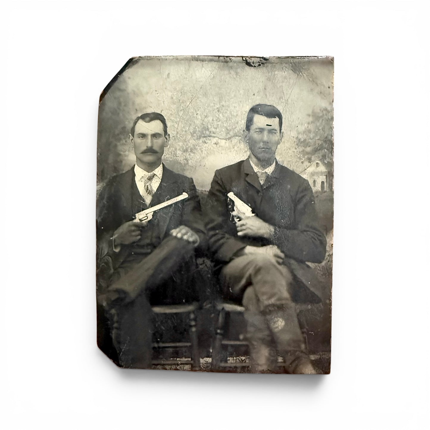 Pistol Toting Buddies - Tintype Vintage photograph of two men holding guns, framed as a rectangular panel.