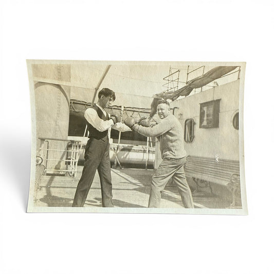 Put 'Em Up Boxers - Snapshot of two men with boxing gloves on a ship