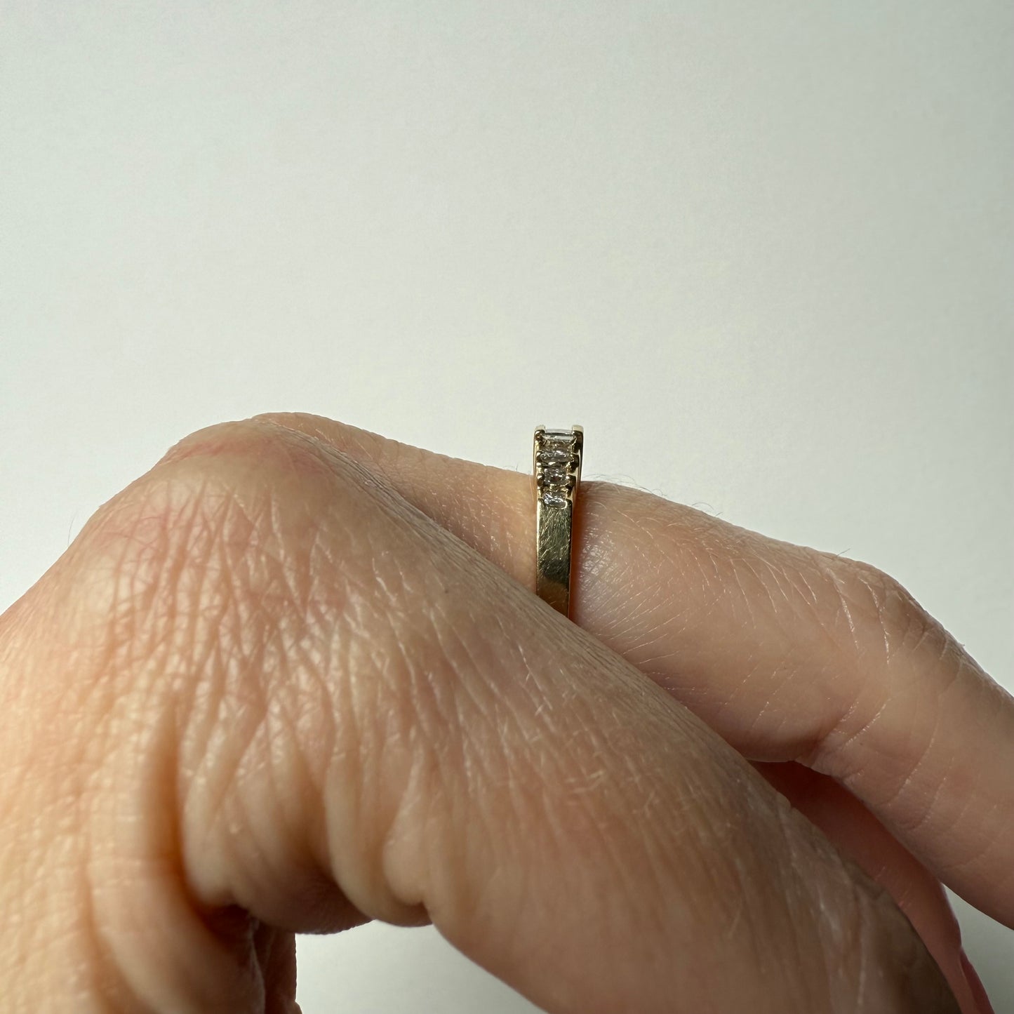 Pyramid Rise 14k Yellow Gold Princess Cut .54ctw Diamond Ring on hand side view