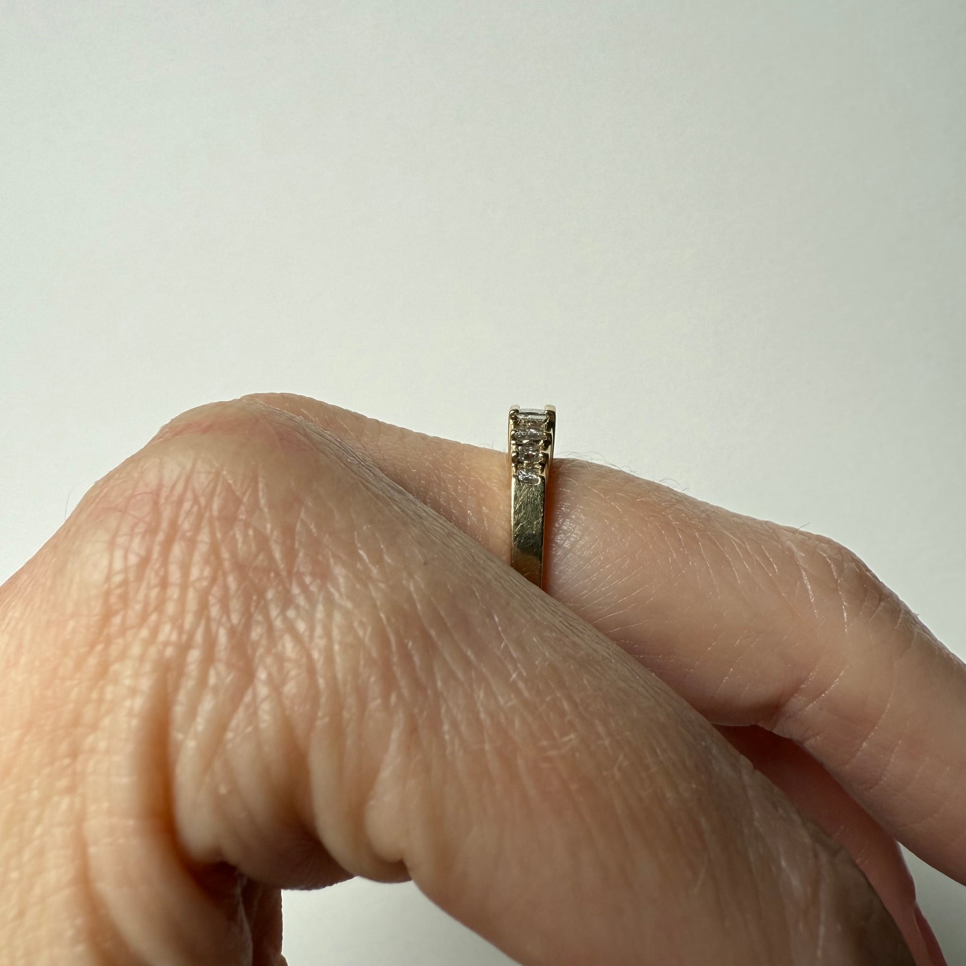 Pyramid Rise 14k Yellow Gold Princess Cut .54ctw Diamond Ring on hand side view